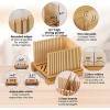 Bamboo Bread Slicer for Homemade Bread Loaf. Adjustable Width Bread Slicing Guides. Sturdy Wooden Bread Cutting Board. Compact & Foldable for Stowing. Makes Cutting Bagels or Even Bread Slices Easy.